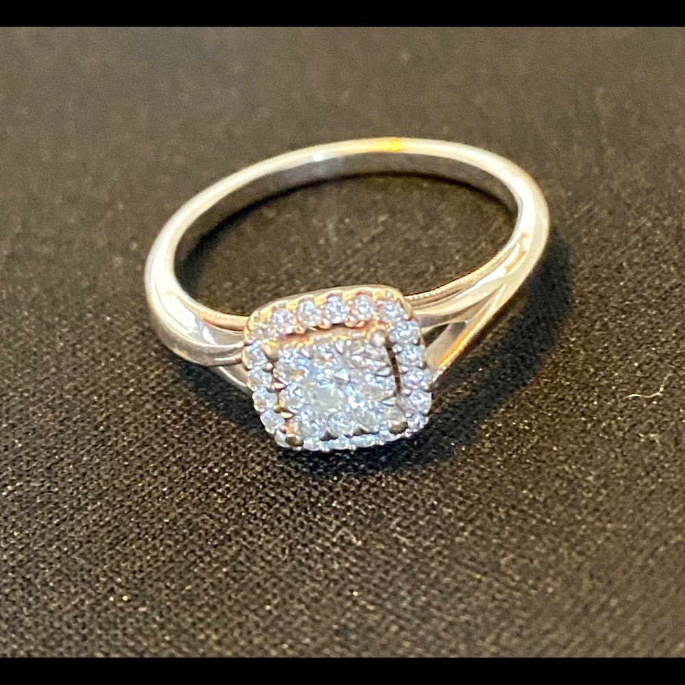 White gold, real diamonds size 8 engagement ring.